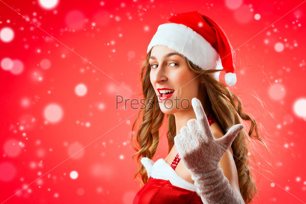 Santa Claus woman wanting you to come over, stock photo