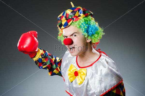 Funny clown with box gloves, stock photo