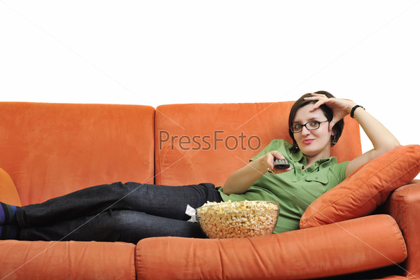 young woman eat popcorn, watching movies and eat popcorn at modern home living room  isolated on white background