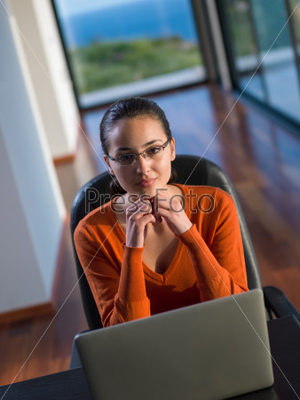 young business  woman working on laptop computer at modern home office