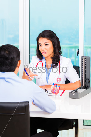 Asian patient consultation doctor s office