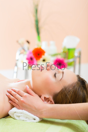 Wellness - woman receiving head or face massage in spa