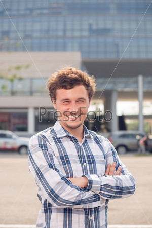 Portrait of happy confident man outdoors