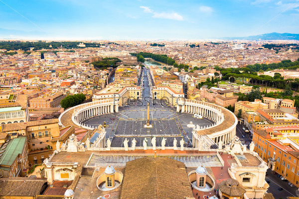 Rome, Italy. Famous Saint Peter\'s Square in Vatican and aerial view of the city from Papal Basilica of St. Peters dome.