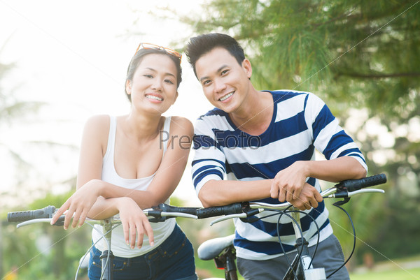 Asian couple with bicycles