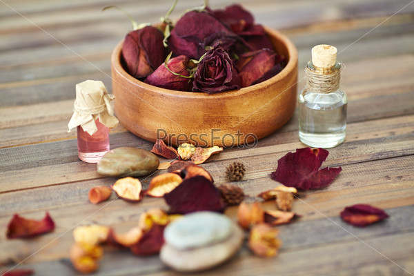 Dry roses, rose petals, leaves and scented oils