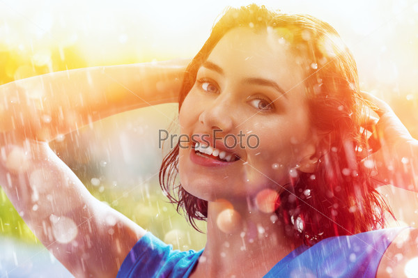 a smiling woman happy rain