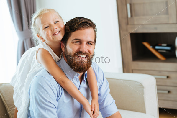 Father and little daughter enjoying their time at home