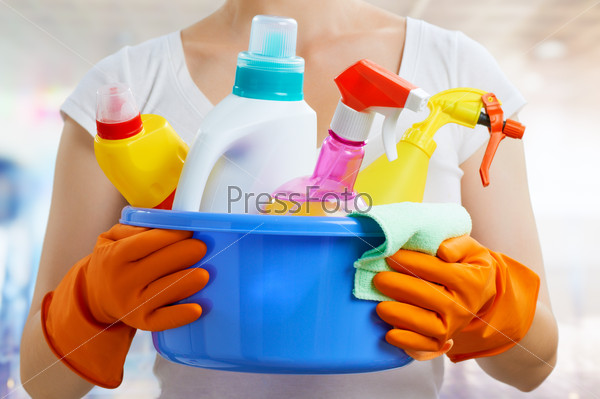 Woman with a pack of detergents