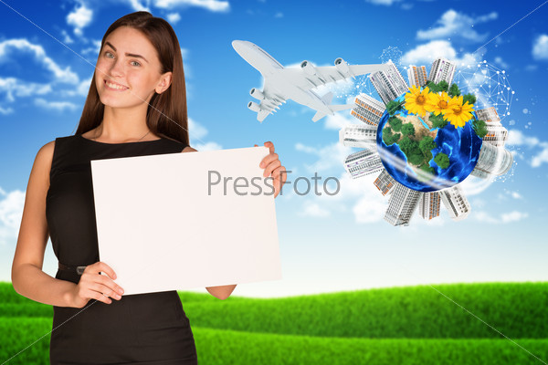 Businesswoman holding empty paper. Earth with buildings and nature landscape