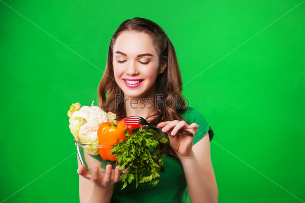 happy woman eating healthy food. woman on a diet