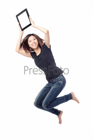 Young beauty happy jump and showing tablet pc in the air isolated on white background, model is a cute asian