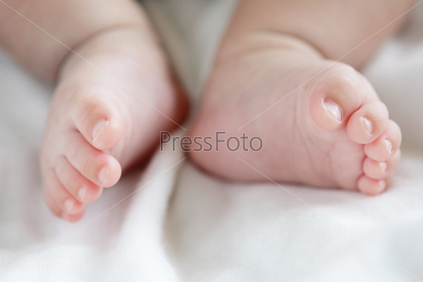 cute Little baby feet toe close up