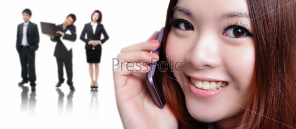 Young business woman speaking mobile phone with sweet smile with business background, model is a asian beauty