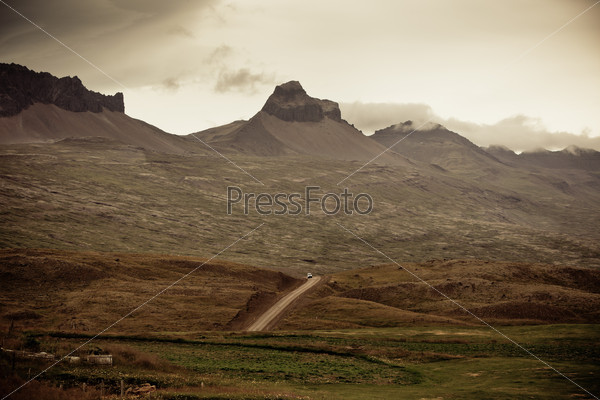 Highway through Iceland Mountains landscape. Horizontal shot