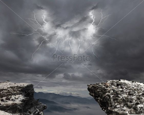 danger precipice on the mountain with rainstorm clouds and lightning
