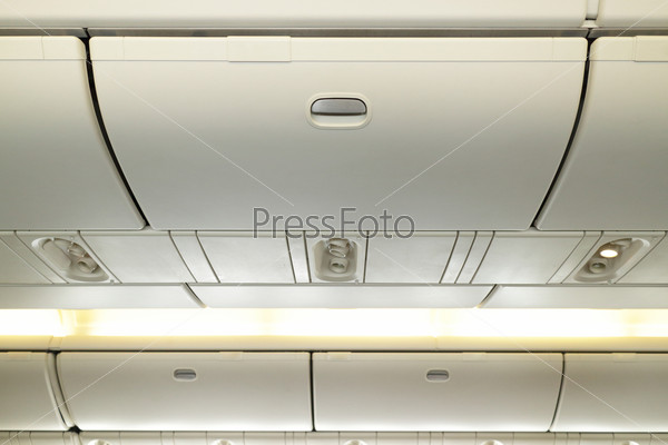 Commercial aircraft interior in airplane cabin, Overhead compartment