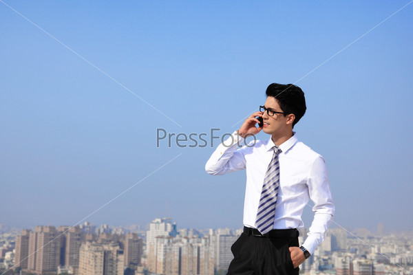 Happy business men call by smart phone on business architecture background