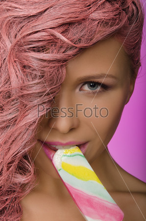 beautiful woman with pink hair and candy