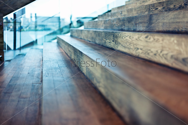 Close-up old wooden stair in modern interior. Beautiful DOF effect