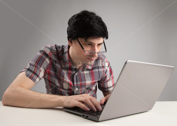 man working on laptop