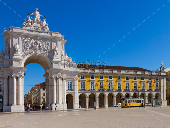 Rua Augusta Arch is a triumphal arch-like, historical building and visitor attraction in Lisbon on Commerce Square at day. Portugal