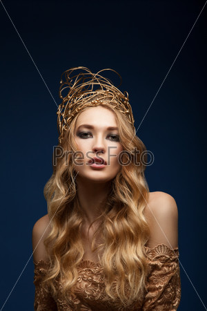 Portrait of a sensual woman with wire crown on head