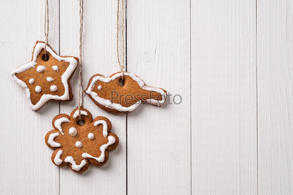 Cookies made by hand in the form of Christmas ornaments. Space for text