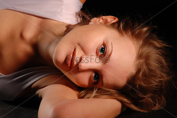 girl in studio. photo of the girl in the fabric in the studio using a single light source