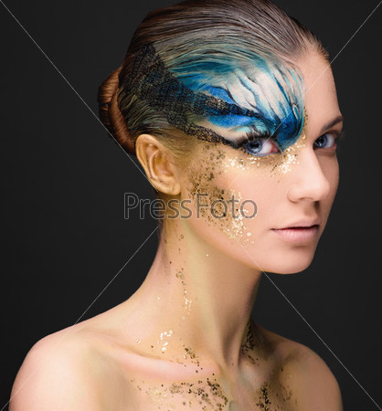 Young woman with fantasy make up