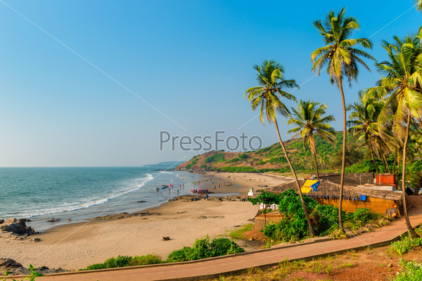 calm ocean and sandy beach in Goa