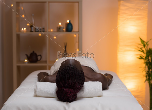African beauty woman getting spa