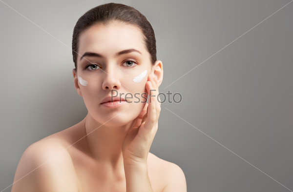 Beauty woman on the grey background, stock photo