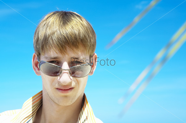 Portrait of young gorgeous male in outdoor environment