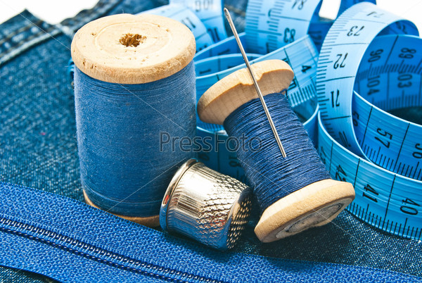 various items for needlework closeup on white background