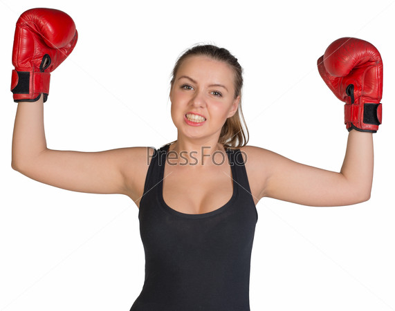 Woman in boxing gloves posing with her arms up, looking at camera. Isolated on white background