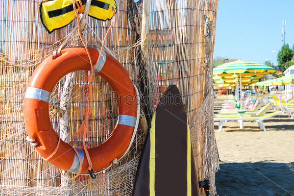 Safety equipment on the beach. Lifebuoy and belt