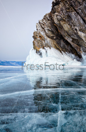 Rocks on winter Baikal lake