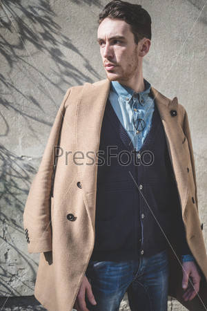 young handsome fashion model man outdoors