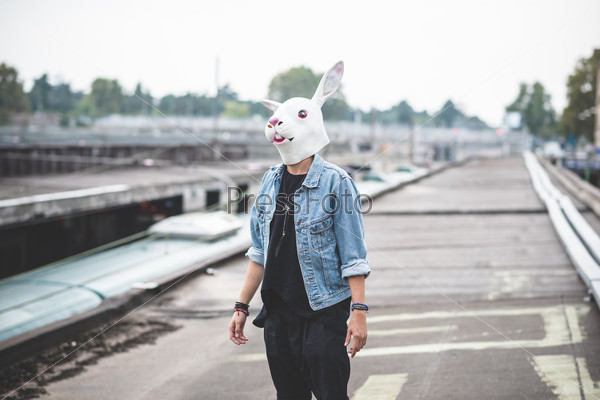 rabbit mask young handsome bearded hipster man in the city