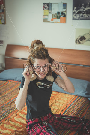 young lesbian stylish hair style woman at home