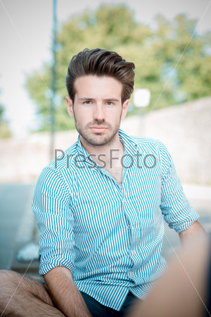 young handsome hipster modern man outdoor in summertime