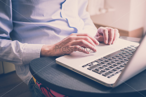 close up hands multitasking man using  laptop  connecting wifi