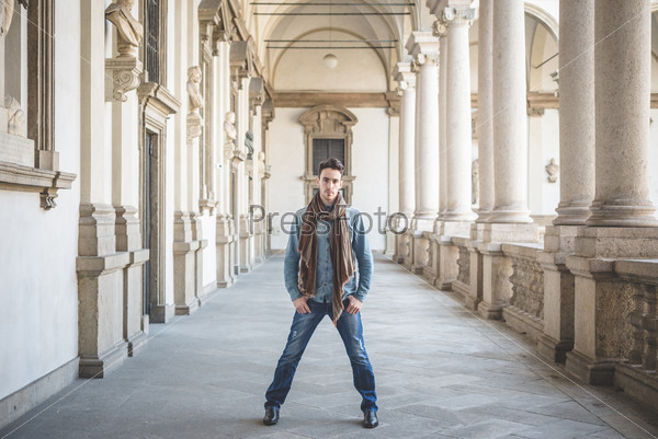 Young handsome fashion model man outdoors, stock photo