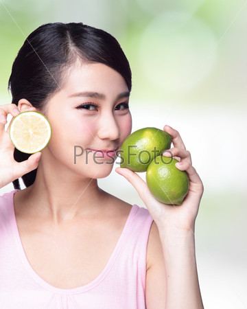 Health girl show lemon with smile face, health food concept, asian woman beauty