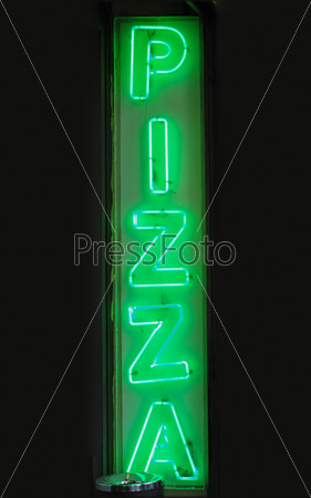Green neon light pizza sign marking a pizzeria restaurant