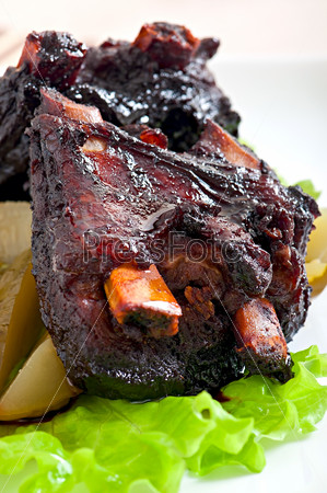 Baked beef ribs in honey soy marinade with pickled vegetables