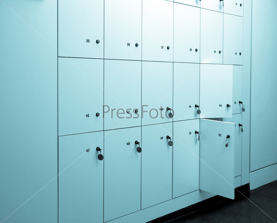 Lockers cabinets in a locker room at school or museum or station - cool cyanotype