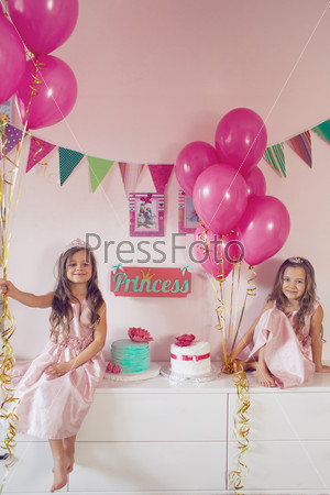 Celebrating princess birthday party of two 6 years old sisters