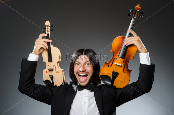 Man violin player in musican concept, stock photo